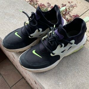 Nike tennis shoes.  Nike sneakers.